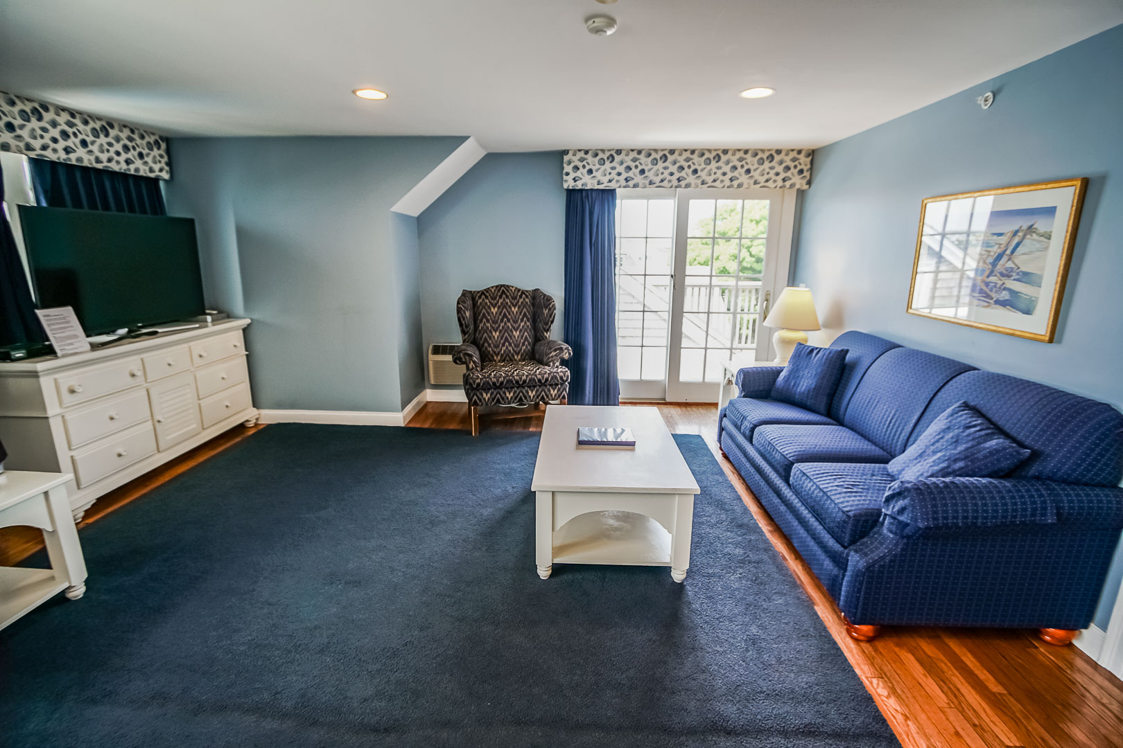 A spacious living room at VRI's Beachside Village Resort in Massachusetts.